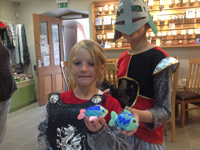 A fleet of colourful sailing boats made by children under the instruction of Margaret Taylor-Hill.